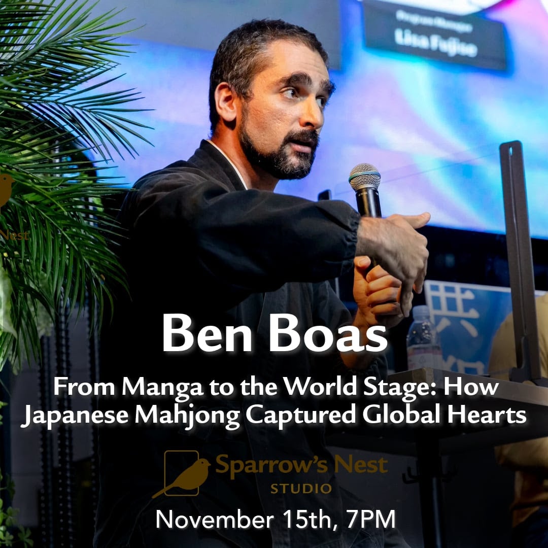 Benjamin Boas speaking into a microphone with text about event.